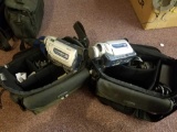 Pair of Sony handycams with cases and cords
