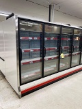 Hussmann 4 glass door freezer with 1 end cap