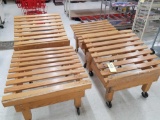 Wood produce displays on casters with slant tops