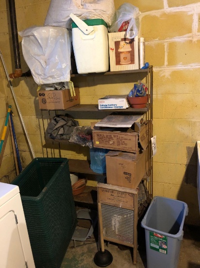 Basement shelf with washboard, cooler and household items