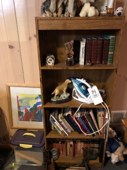 Assorted books, figurines and bookcase