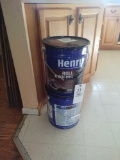 Two buckets of Henry roll roofing