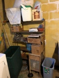 Basement shelf with washboard, cooler and household items