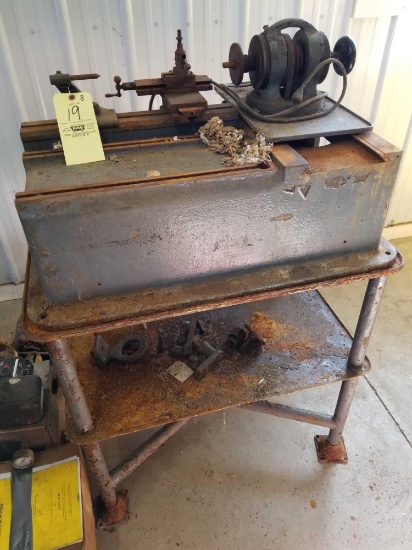 Heavy lathe with iron stand