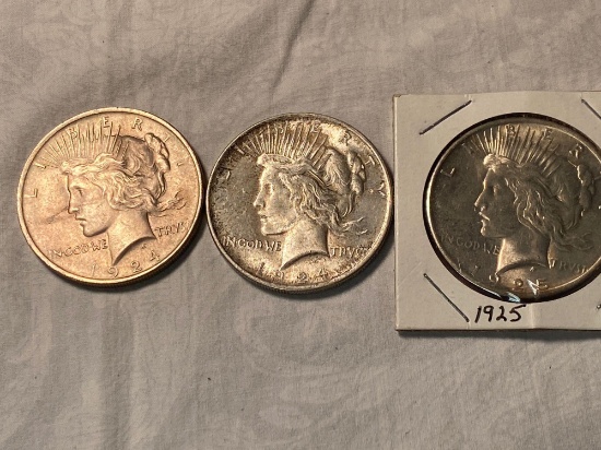 (3) Peace silver dollars (two 1924, 1925), circulated. Bid times three.