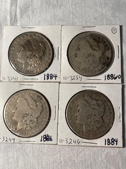 (4) Morgan silver dollars (1881, two 1884, 1886-O). Bid times four.