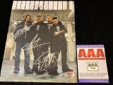 Autographs of four members of Creed, Autograph Authentication Authority COA #A17165.