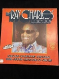 Ray Charles signed record album. Bottom cover has separation. InPersonAuthentics COA #232917.