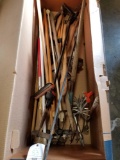 Box of lawn tools, pitchfork, shepherds post