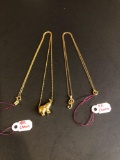 (2) gold necklaces