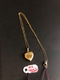 14k gold necklace w/ heart locket