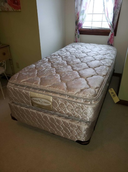 Twin mattress and box spring on hollywood frame