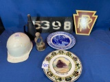 Group of Railroad collectibles including plates, hardhat, Pennsylvania railroad lighter, cardboard
