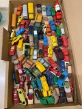 Assorted miniature plastic and die cast cars for layout
