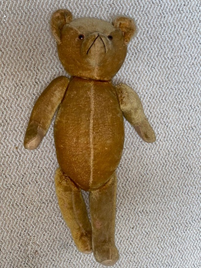 Early 1900's Teddy bear, unmarked, good condition for age, straw stuffed, glass eyes, 24" tall.
