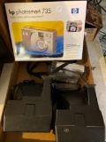 2 Polaroid cameras, 1 camcorder and case, and 1 digital camera