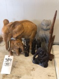 Plaster elephants (may find some damage), carved tribal figures, stone cat statue, monkey
