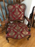 Floral nail trim upholstered armchair