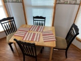 Table with 4 padded chairs