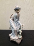 Lladro F24M figurine 10 inches tall, flowers may have damage