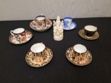 Oriental style cups/saucers and figure
