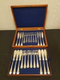 Set of monogramed flatware with case