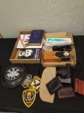 Radio, wallets, microphone, Charles Lindburg books
