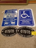 Metal parking signs and plastic coach plaques
