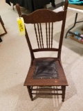 Press back chair with leather seat