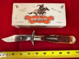 1994 Winchester Cartridge Series folding knife, burnt orange bone, #19109.