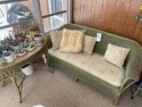 Early wicker padded bench and table