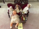 Assorted ceramic dolls, Jester, doll couch.