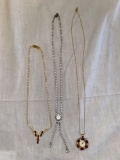 B. C. Lynd 14K electroplated watch on necklace, (2) rhinestone necklaces.
