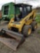 2005 Cat 246B skidloader with material bucket, front remotes, approx. 900 hours, runs good