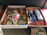 Two boxes, fishing lures, knife, etc.