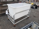 Plastic tub with spout on wheels