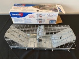 Havahart animal cage trap.