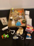 Junk drawer items incl. playing cards, furniture touch up markers, old valentine...