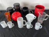 Canisters, measuring pitcher, ceramic apple, frosted mugs, etc.