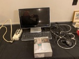 HP 2009m model computer w/ keyboard & mouse. Power outlet cord. Sprint P8167 PCS phone.
