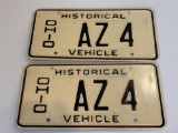 Pair Ohio historical license plates.