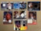 (7) Basketball game jersey swatch cards. Bid times seven.