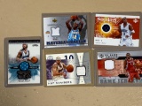 (5) Basketball jersey swatch cards. Bid times five.