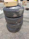 Set of 4 mounted Goodyear Wrangler tires, 265/70R17