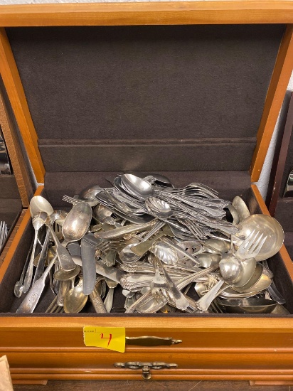 Miscellaneous silverware in chest