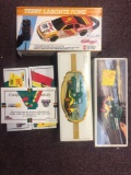 5 diecast vehicles in boxes