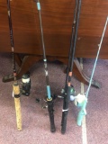 4 fishing rods and reels