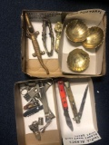 Brass nutcrackers, ashtrays, switch blades, cigar cutters