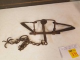 Hand forged leg hold trap with hook and chain