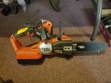 Black & Decker cordless chainsaw with charger